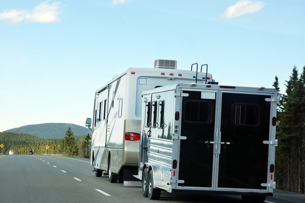 RV Camper Towing a Trailer