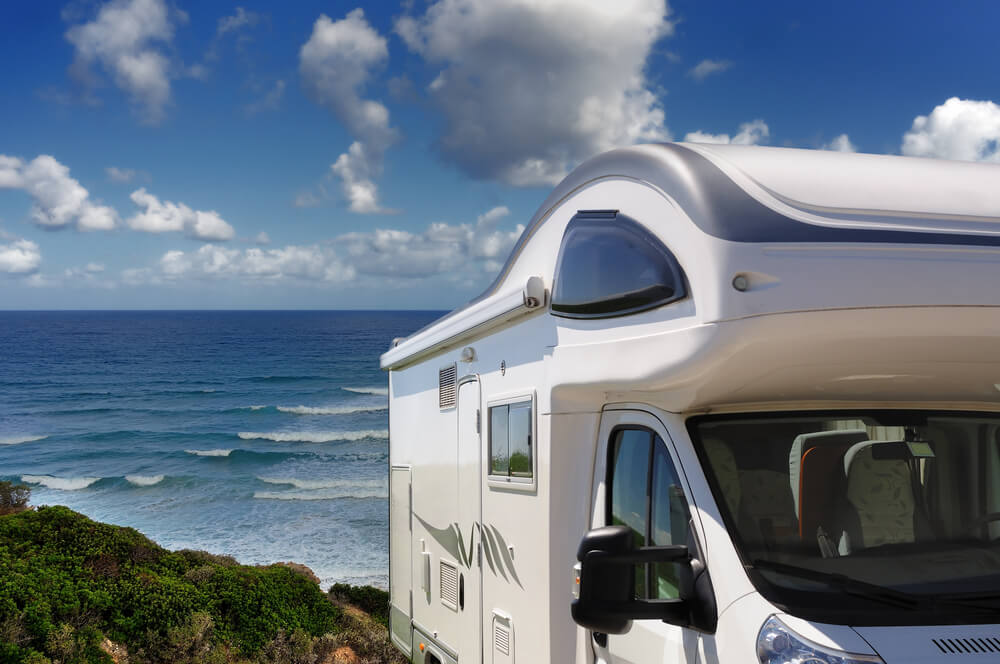 An RV Campervan Parked on the Beach